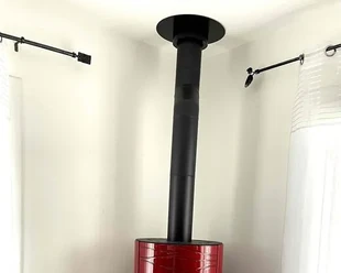 Pose d’un conduit de fumée autour d’un poêle en Dordogne